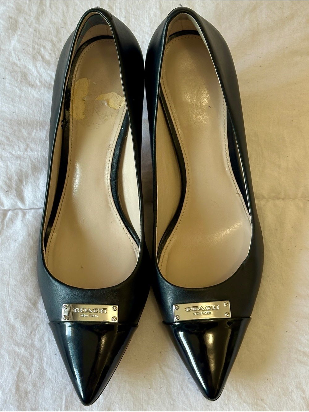 Coach Black Pointed-Toe Leather Flats with Logo Cap